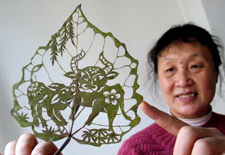Leaf carving - a arte de esculpir em folhas U138P200T1D206889F10DT2008122321522 | Arte | Arte, bizarro, china, chinês, curioso, folhas, incrível, maluco