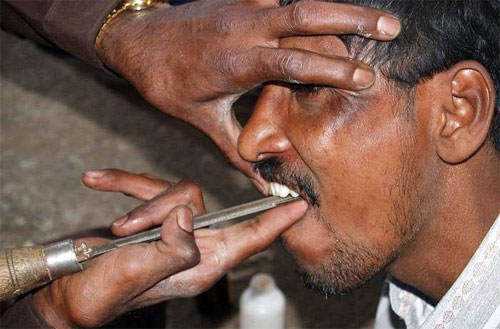15 bizarrices envolvendo dentes street-dentist-01