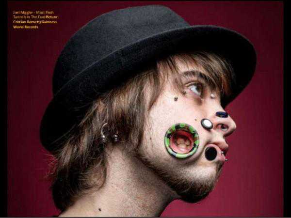 Conheça Joel Miggler, o recordista de... Pessoa com mais buracos na cara joel-miggler-flesh-tunnels6-600x450